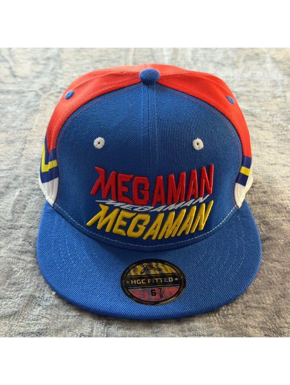 Headgear Classics Mega Man Fitted Hat 6 7/8 Blue Red Yellow Retro Gaming Cap